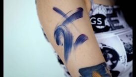 Treknrakstā otas triekas: meistarība Statement Arm Tetovējuma stāstos